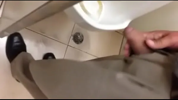 Hot crown taking a friendly hand in the public bathroom and enjoying warm Movies