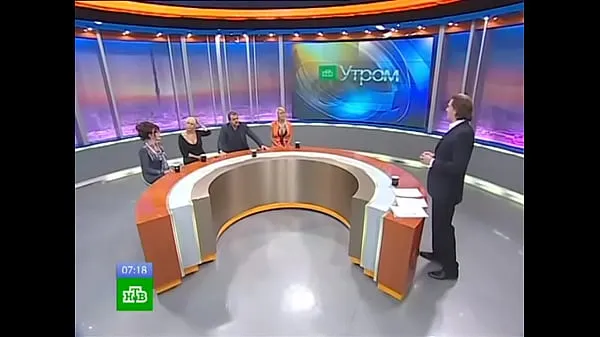 Hot Bimbo blonde on panel of Russian TV show - upskirt porn at warm Movies