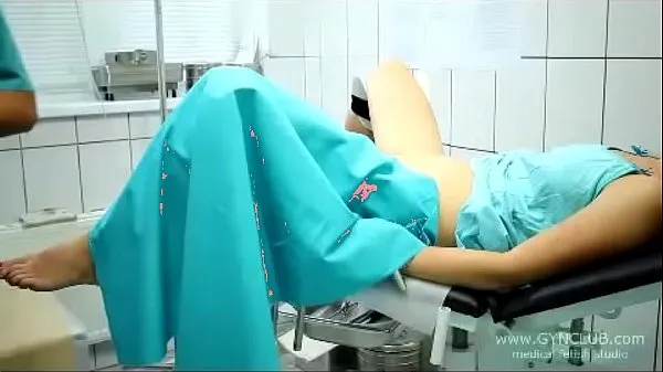 Hot beautiful girl on a gynecological chair (33 warm Movies