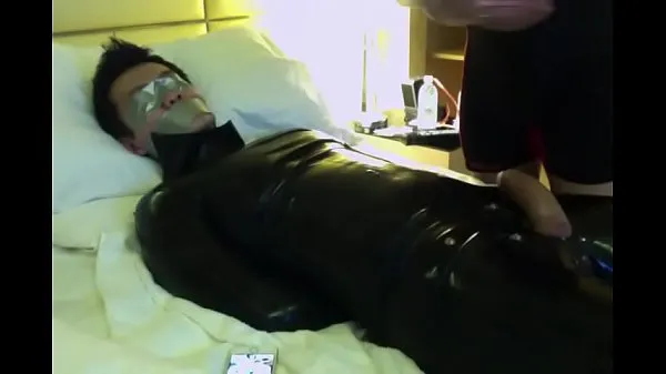 گرم tape gagged asian sub in rubber suit. Being masturbated until he chums گرم فلمیں