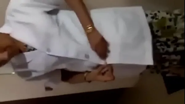 Hete Tamil nurse remove cloths for patients warme films
