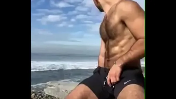 jerking off at the beach Films chauds