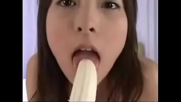 Žhavé Sexy Pretty Naughty Sultry Girl sucking and licking on Hot Banana and cream all over her žhavé filmy