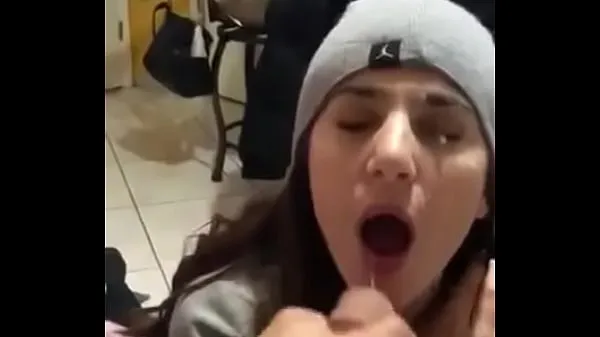 Hete she sucks it off and they cum on her face warme films