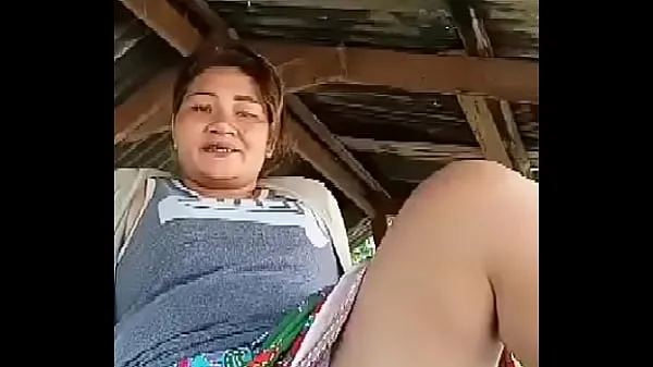 Heiße Thai Tante blinkt im Freienwarme Filme