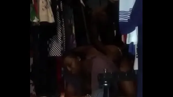 Vroči A black Africa woman fuck hard in her shop from behind topli filmi