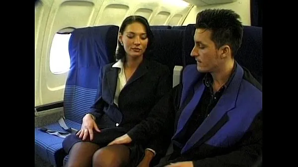Brunette beauty wearing stewardess uniform gets fucked on a plane Filem hangat panas
