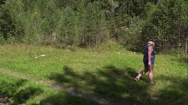 Hot Voyeur in nature spying on a mature BBW. A mom in a public clearing undresses, sunbathes and fucks with a banana. Natural boobs, juicy booty and overgrown cunt warm Movies
