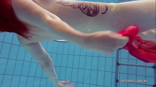 Petite teen Katrin swims naked in the pool Filem hangat panas