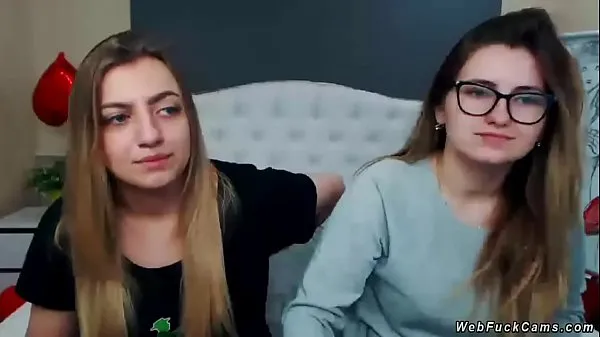 گرم Two brunette amateur teen lesbian hotties stripping and tying in bed then licking in their private live webcam show on homemade footage گرم فلمیں
