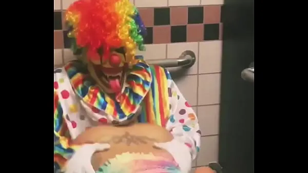 Girl rides clown in bathroom stall Filem hangat panas