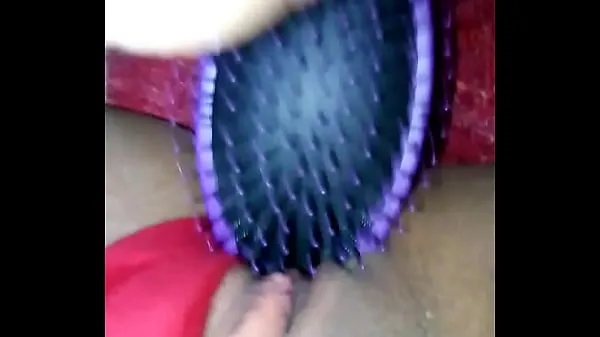 Hot Masturbates with the handle of the hairbrush warm Movies