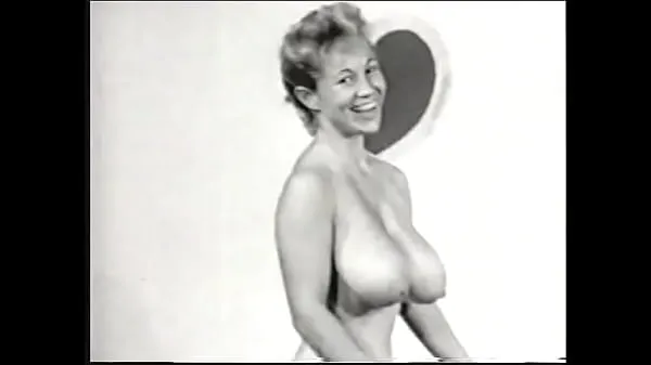 Hot Nude model with a gorgeous figure takes part in a porn photo shoot of the 50s warm Movies
