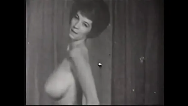 Heta Curvy brunette in black stockings strips passionately for the camera in a 60s porn movie varma filmer