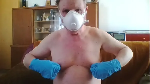 Andreas with a dust mask and gloves picks one off Films chauds