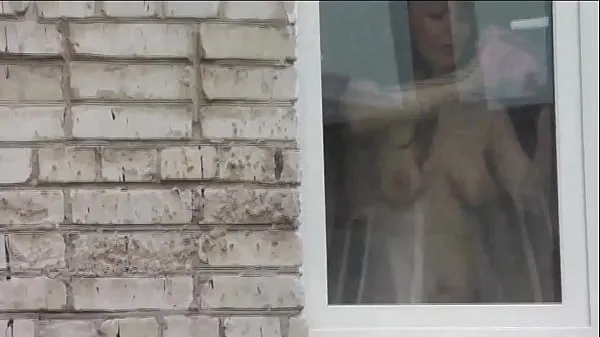 Hot Naked in public. Nude. Outdoor. Outside. Husband Sexy Frina is spying on her from car window when she washes apartment window no panties and bra warm Movies