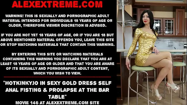 Hotte Hotkinkyjo in sexy gold dress self anal fisting & prolapse at the bar table varme film