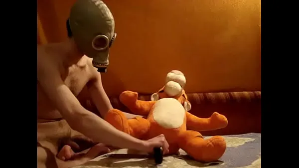 Hot Twink in gas mask inflates his plushie warm Movies