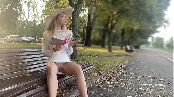 گرم She reads a book and flashs pussy in public park گرم فلمیں
