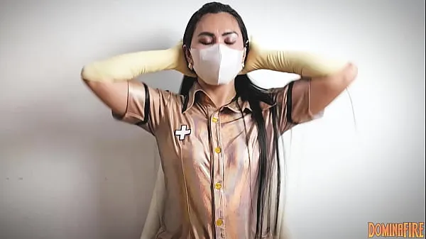 Film caldi Asian Nurse Wearing Long Rubber Glovescaldi