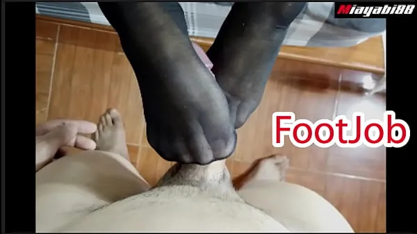 Heta Thai couple has foot sex wearing stockings Use your feet to jerk your husband until he cums varma filmer