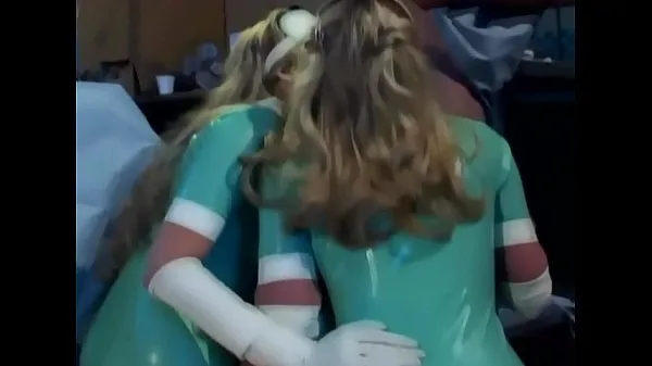 Hot Two latex nurses in uniform have a hot threesome warm Movies