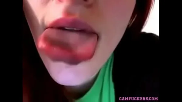 Nóng Sexy redhead teen shows what she can do with her tongue Phim ấm áp